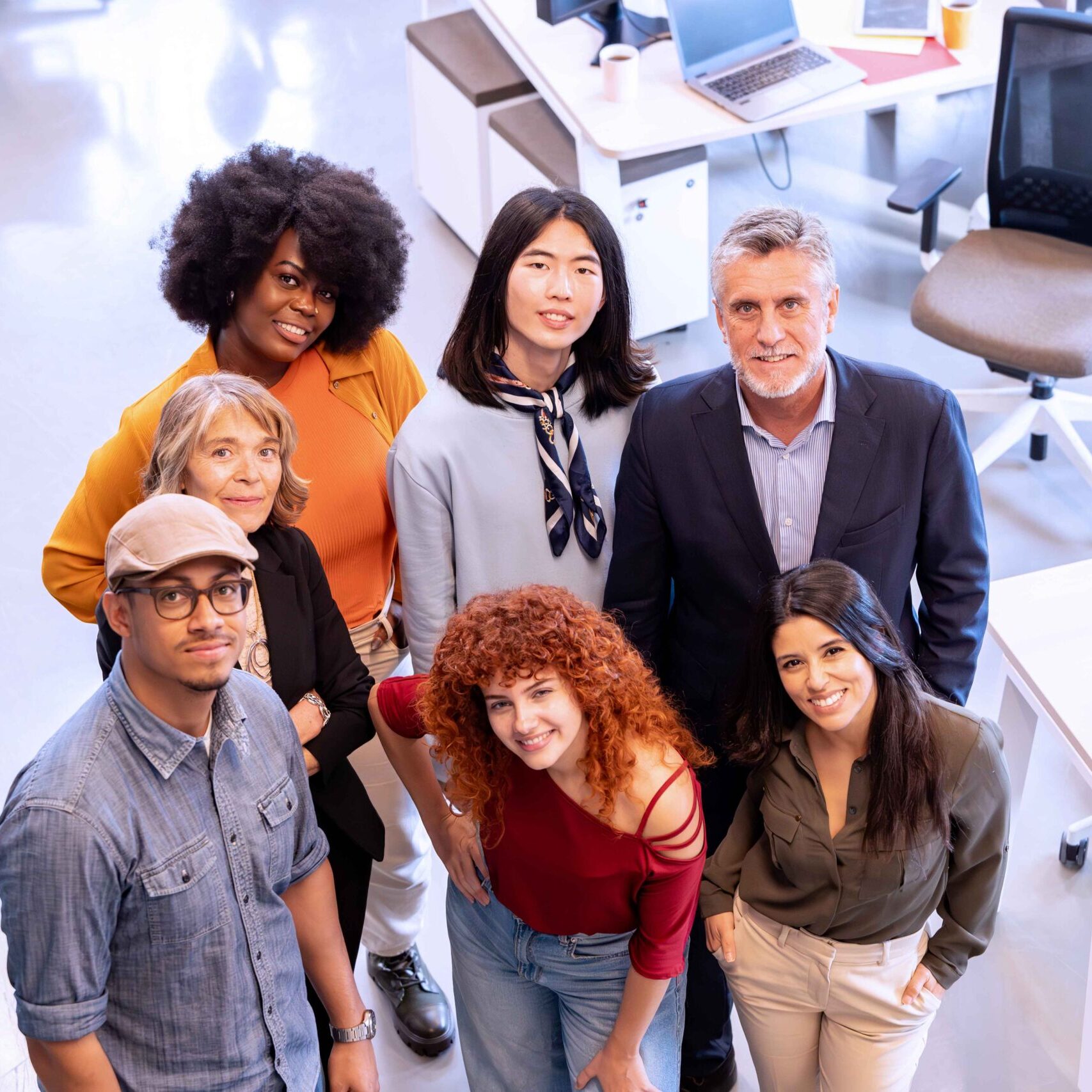 diverse-business-team-smiling-while-posing-togethe-2023-12-14-23-47-26-utc_11zon