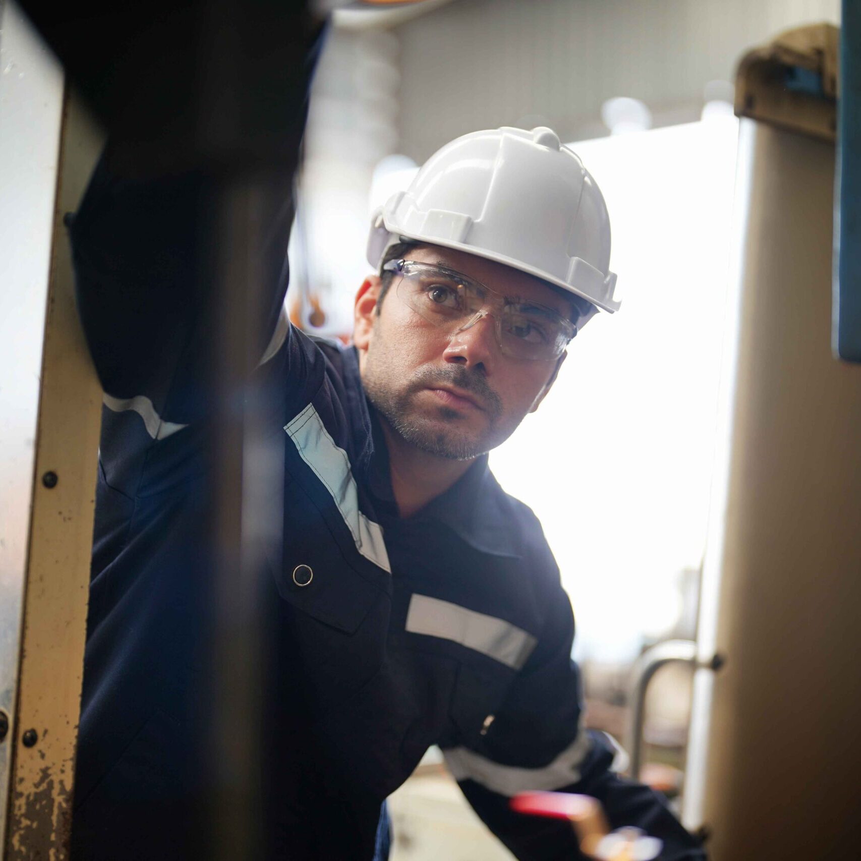 male-automation-engineer-testing-cnc-machine-in-he-2023-11-27-05-34-39-utc_11zon